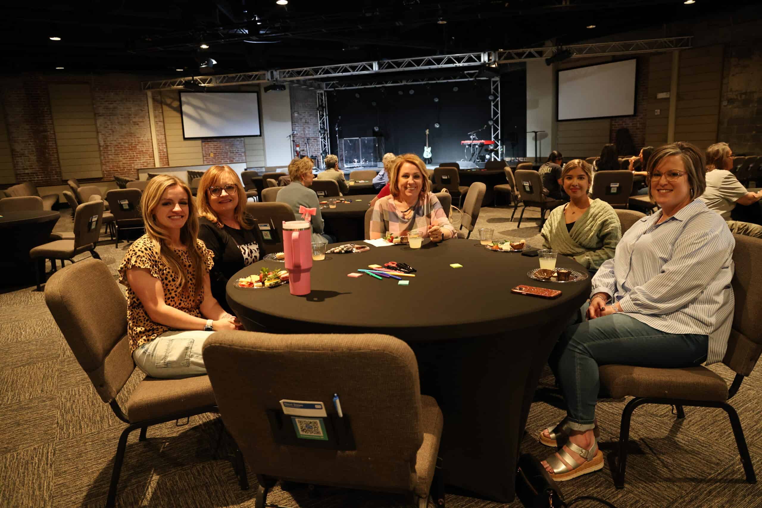 women around a table