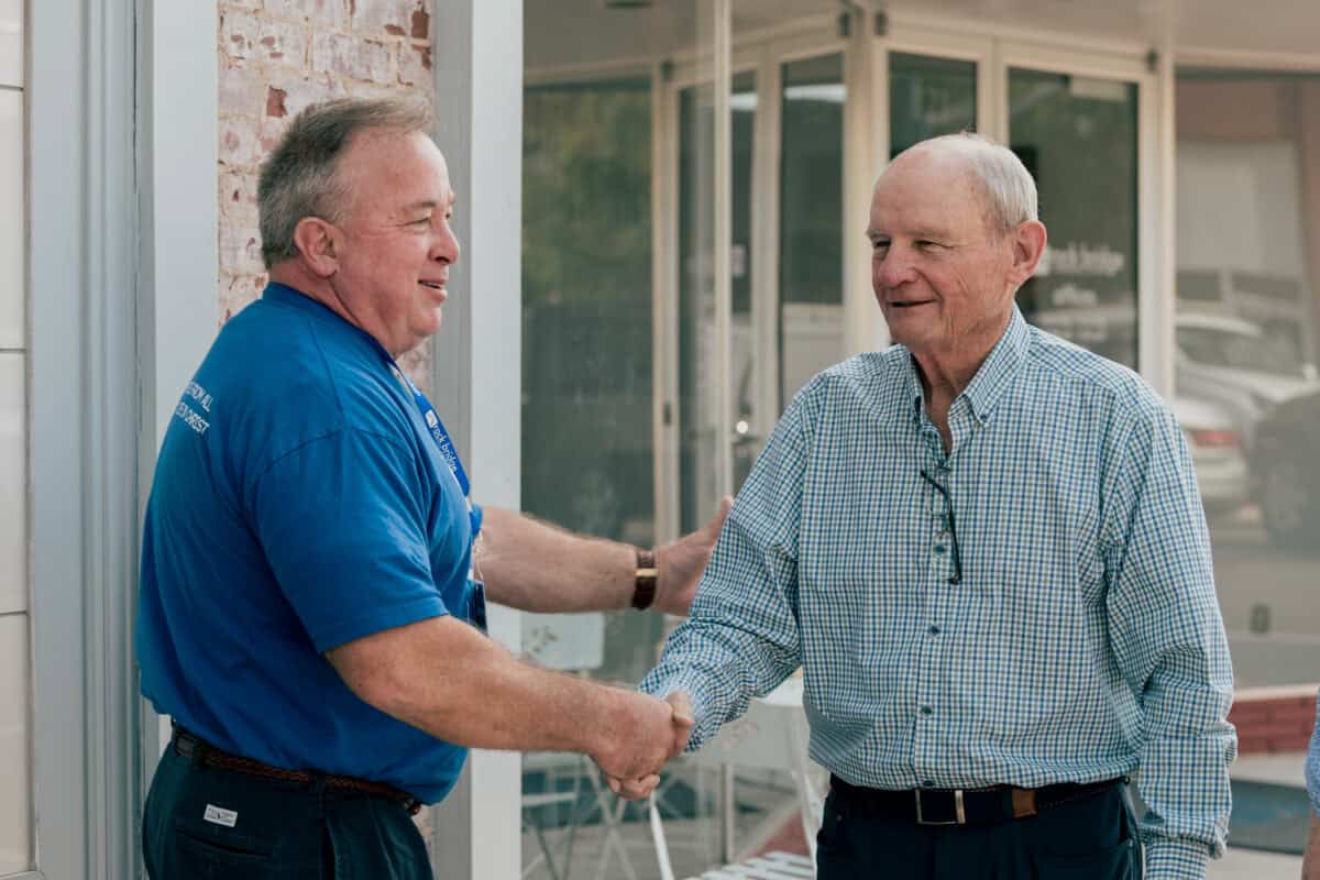 man greeting